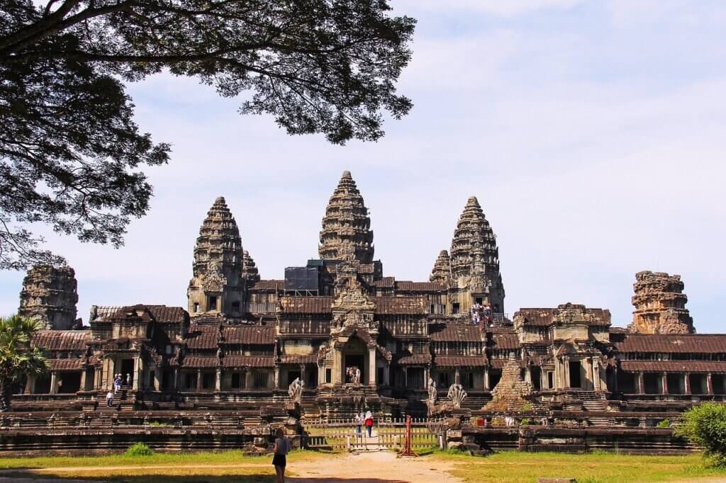 Angkor Wat in Cambodia, the world’s largest religious monument, with its iconic lotus-bud towers and intricate architecture.